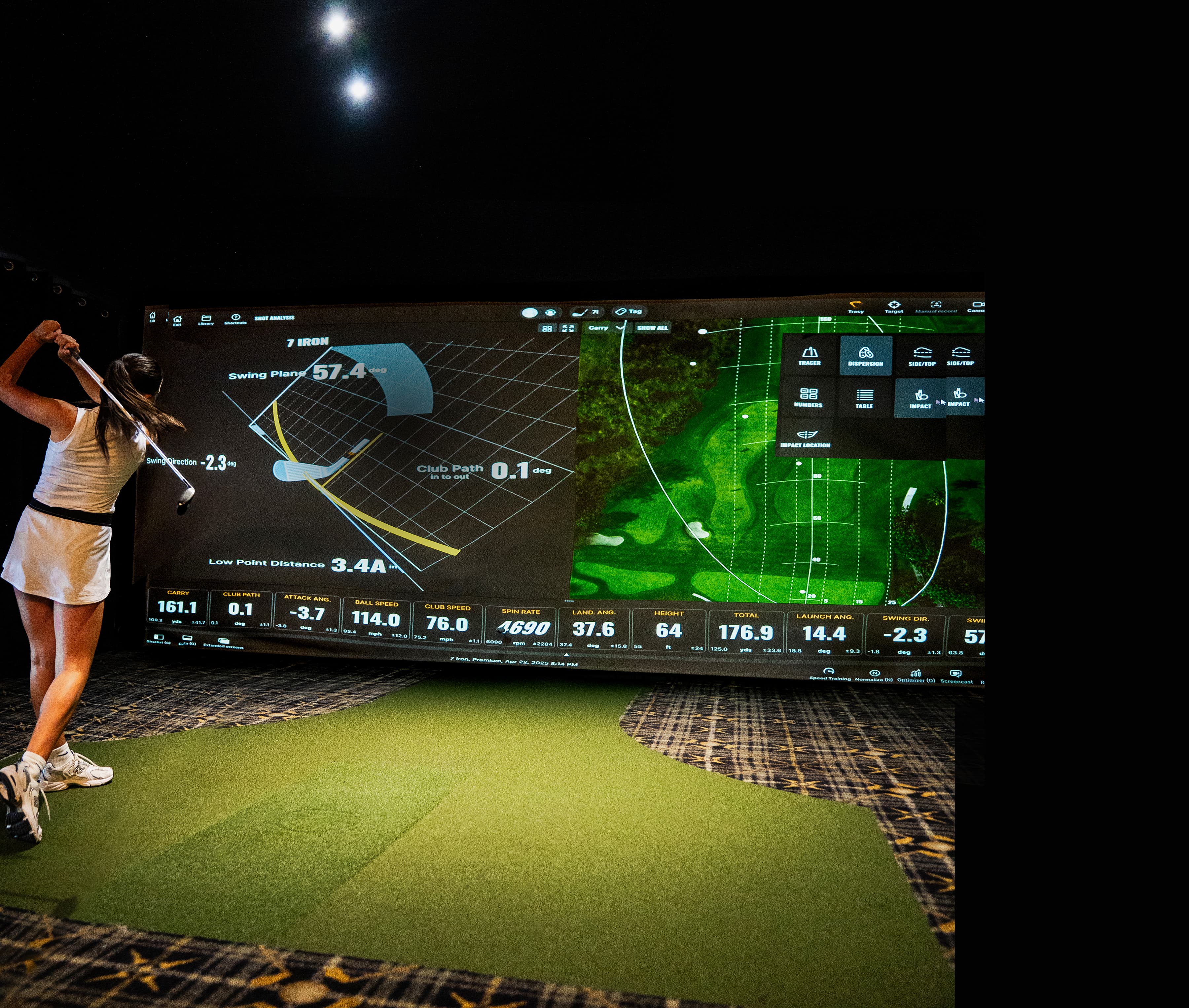 Guests enjoying the golf simulator experience